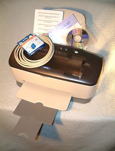 Lieferung mit Kabel, Handbuch, Ersatzpatrone und CD